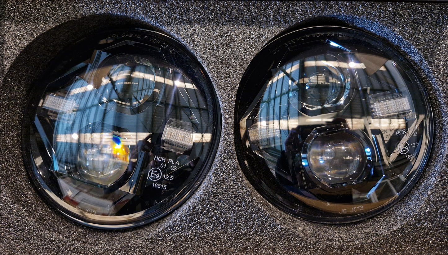 Pareja Faros Delanteros LED 7"- Fondo Negro - Para SANTANA y DEFENDER obligatoria BA 051